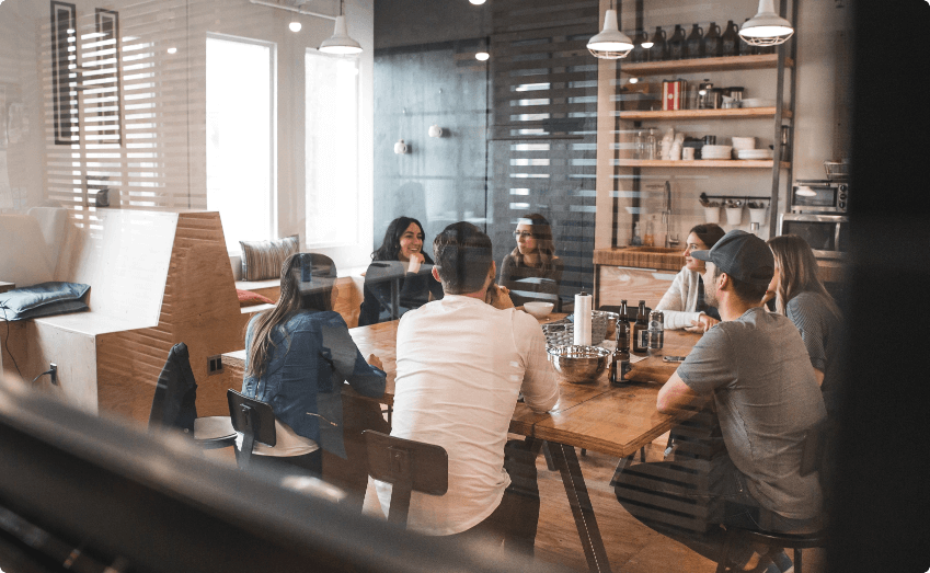 employees networking at a coffee shop